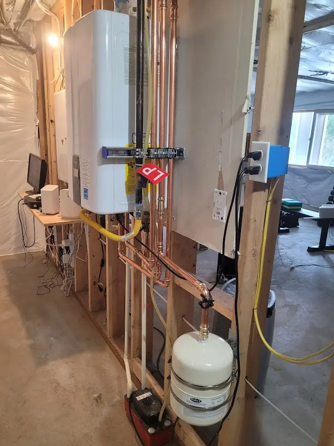 Licensed plumber repairing a kitchen sink in Berrien